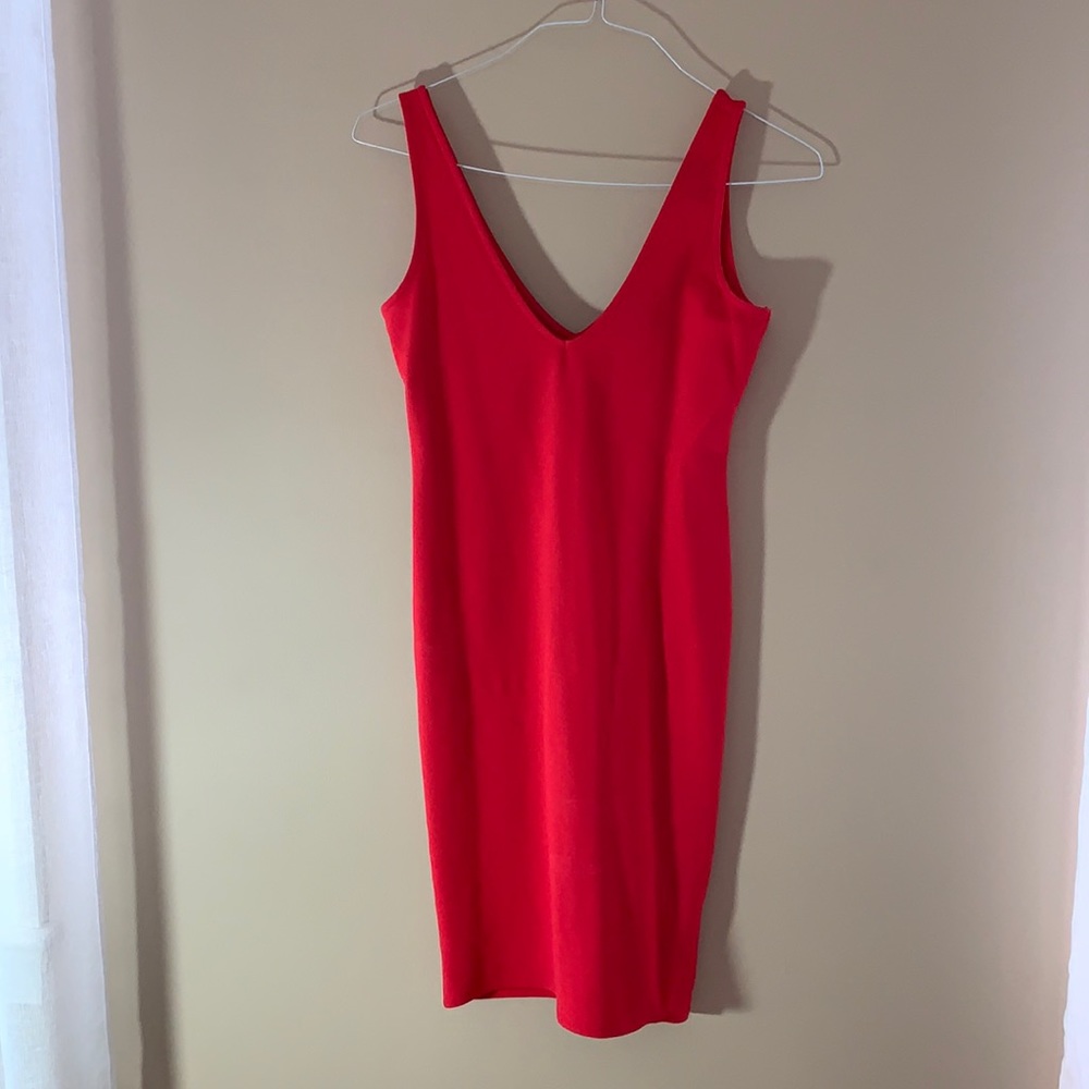 Red form fitting dress